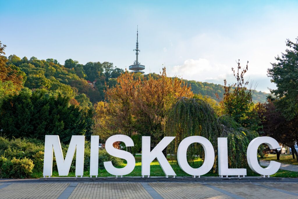Miskolc,Text,Sign,In,The,Park,Downtown,With,Radio,Tv